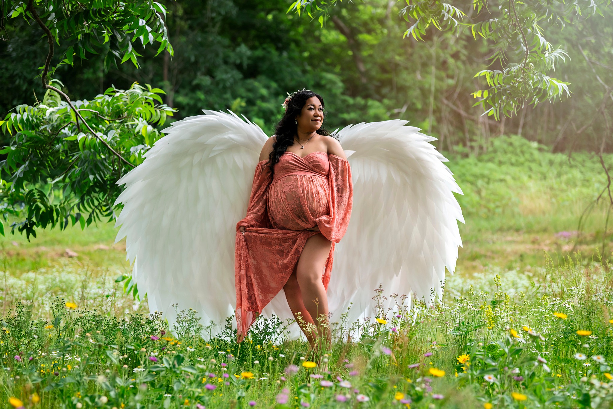 Maternity picture with wings at the little ranch farm